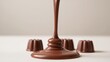© LoFi J. - Chocolate Cascade. Melted Chocolate Pouring Over Delicious Chocolate Candy Treats.