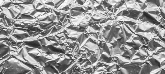 Wall Mural - shiny metal silver gray foil leaf crumpled texture background