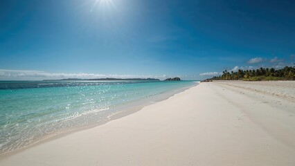 Wall Mural - Peaceful coast featuring soft white sand and vibrant turquoise sea