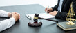 © Thitiphat - Male lawyer or counselor discussing negotiation legal case with client meeting with document contract in office, law and justice, attorney, lawsuit concept