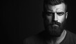 © Tetiana - Confidence Attractive Hipster: Dramatic Black And White Studio Shot Featuring A Bearded Man With Copy Space And Dramatic Lighting.