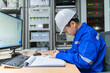 © reewungjunerr - Engineer working at control room,Manager control system,Technician man monitoring program from a lot of monitor