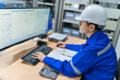 © reewungjunerr - Engineer working at control room,Manager control system,Technician man monitoring program from a lot of monitor