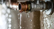 © delila - Plumber Fixing: Close-up of Leaking Copper Pipe with Water Drops and Splashes