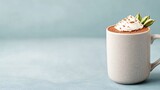 Cozy creamy hot chocolate topped with whipped cream and garnish