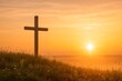 © willem - Wooden Cross Silhouette Against Golden Sunrise on Grassy Hillside