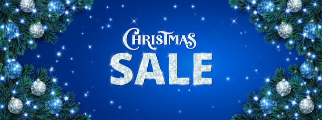 Wall Mural - Christmas sale banner. Christmas tree corner frame with ornaments, Christmas lights. Blue and white glitter decoration. Christmas Sale shiny typography. For winter season promotions. Vector.