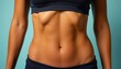© Busban - Close-up of a sculpted midriff, revealing well-defined abdominal muscles , medical image, flat stomach