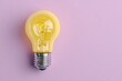 © moki - A single, warm-yellow lightbulb sits atop a soft, muted lavender background.  The bulb's glass is translucent, revealing the glowing filament inside.  A metallic base anchors the bulb