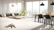 © Taras Vykhopen - Keys resting on a modern table in a bright and airy living space with open windows