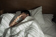 © kieferpix - sad depressed tired man in bed can't sleep, insomnia, depression, mental health concept