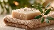 © Ungulavender - Moist bar soap on towel, fresh leaves