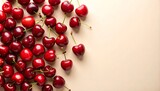 Ripe Cherries on Beige Background.