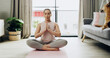 © peopleimages.com - Woman, breathing and namaste for yoga at house with meditation, mindfulness and peace. Female person, prayer hands and eye closed for spiritual healing, holistic balance and mental health practice