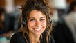 © Johannes - a portrait of a smiling brunette receptionist talking on telephone in the office with selective focus no logos no brands ar 169
