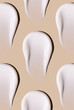 © Екатерина Клищевник - textures pattern of cream smears close-up on beige background