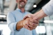 © ttonaorh - Happy businessman shaking hands with his new friend in the office.