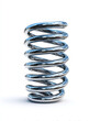 © Rabeya SJ - Close up of a metal coil spring standing upright isolated on white background