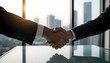 © KOTL - Businessmen Shaking Hands in Modern Office with Cityscape Background at Sunset