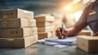 © Justlight - Side view of a customs agent stamping export documents foreground in clear detail while stacks of boxes fade softly in the background.