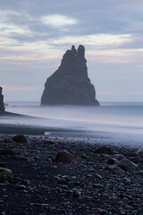Wall Mural - Rocky seascape shore of Reynisfjara Beach, Iceland.