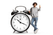 © Ljupco Smokovski - African american male student leaning on alarm clock and gesturing thumbs up
