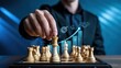 © sohelkhan - Strategic business move with chess pieces and financial growth chart