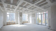 © Gautier Normand - Intérieur d'un appartement en cours de finition dans un immeuble moderne à la lumière du jour.
