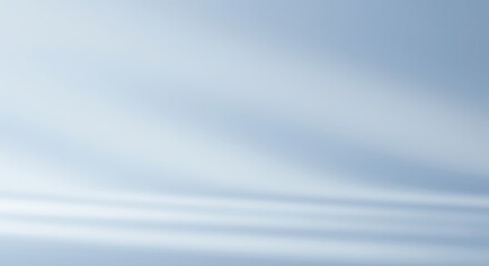 Wall Mural - Ethereal Blue Gradient: Soft Light and Shadow Abstract Background