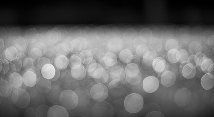 Wall Mural - Ethereal Monochrome: Abstract Bokeh Landscape of Light and Shadow