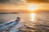 Rear view of a sports motor boat cruising with high speed into the colorful sunset