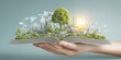 © The Little Hut - Sustainable Development Concept: Open Book Revealing Green Cityscape with Hand Holding