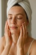 © Tetiana - Caucasian female adult relaxing with skincare routine after shower