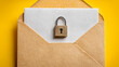 © FS - An open manila envelope with a white letter and a metal padlock on a bright yellow background.
