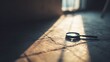 © Nan - A magnifying glass resting on a textured surface with dramatic shadows and soft focus.