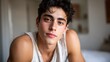© liliyabatyrova - Close-up of a young man showcasing natural beauty with styled hair in a cozy indoor setting during daylight