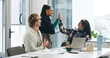 © peopleimages.com - Business, laptop or people with high five celebration for marketing goals, startup growth or deal. Documents, happy employees and congratulations in office for campaign performance and pitch approval