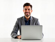 © ma8 - a young caucasian man in a gray suit smiles while working on a laptop, showcasing the connection between aging population and technology, emphasizing modern solutions for elderly care