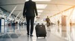 © designdio - Elegant asian businessman checking email on mobile phone while walking with suitcase inside airport, experienced male employer using cell telephone while waiting for taxi car coming before work travel