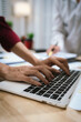 © Worawi - A corporate team collaborates in an office, analyzing financial reports and charts. They discuss strategy, investment, and planning to achieve growth, innovation, success, and long-term business perfo