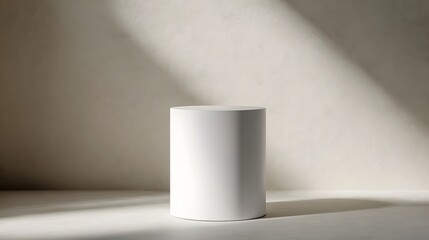 Wall Mural - a clean minimalist white cylinder podium with soft shadows and lighting