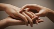 © Feb - Pair of Hands Holding Gently in Warm Neutral Tone, Closeup