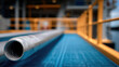© visoot - Close up of blue metal pipe on industrial platform, focus on threaded end, construction site, modern engineering, strong structure