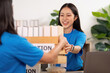 © Natee Meepian - Volunteer teamwork in action: donating items for community support