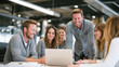 © buraratn - Collaborative team meeting in modern office, featuring six professionals engaged in discussion around laptop. atmosphere is positive and focused, showcasing teamwork and creativity