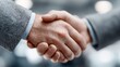 © Andrian Supyanda - Close-up Handshake: Business Deal Concept