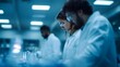 © Thares2020 - Phar eutical laboratory with scientists conducting experiments