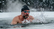 © NATALIA - Man swimming in icy water during winter with snow around