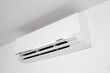 © Abdull - Domestic Indoor Air conditioner unit mounted on wall used for heating or cooling a space