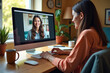 © Vera - Photo of Person Engaging in a Video Conference from Their Vibrant and Comfy Home Office, Accompanied by Coffee and a Furry Friend